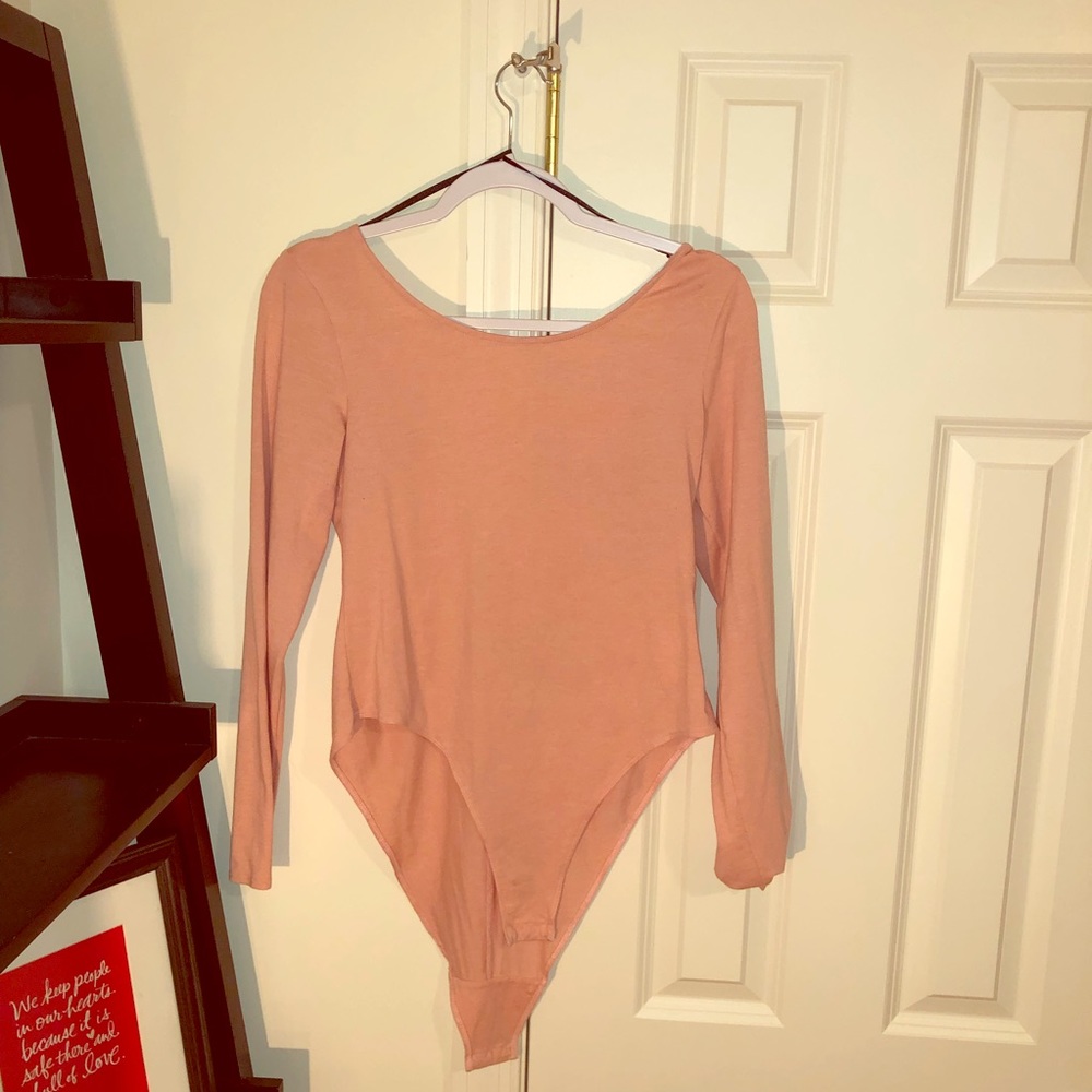 Pink long sleeve body suit
